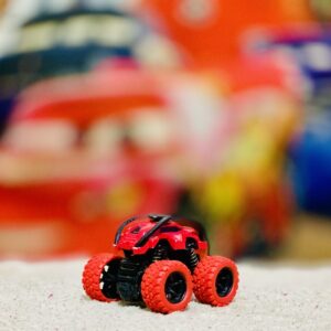 Friction Action Red Monster Truck (3.5") with 360° Roll, Springs & Shocks